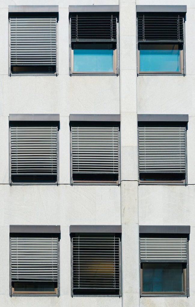 Contemporary building facade in Oslo featuring minimalist window design.